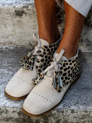 Bold Leopard Creme Boots